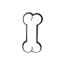 bone crocs charm on a white background