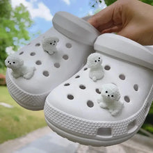white crocs with puppy jibbitz
