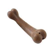 brown dog bone chew toy on a white background