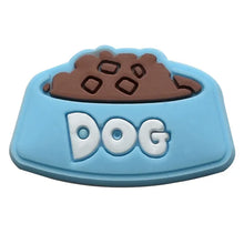 blue dog bowl with food crocs jibbitz on a white background