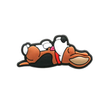 dog lying down jibbitz on a white background