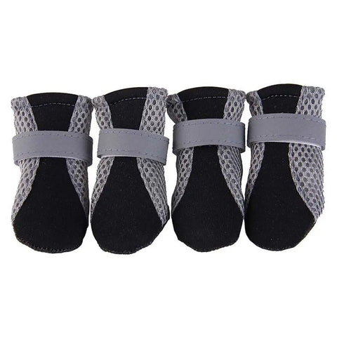 silicone dog boots on a white background