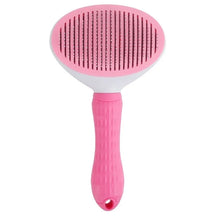 pink pet hair remover on a white background
