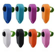 different colors of pet training clicker on white background