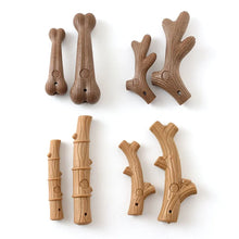 4 sets of dog chew on a white background