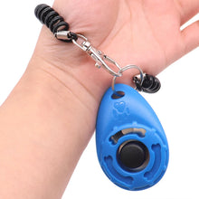 blue pet clicker strap around the wrist