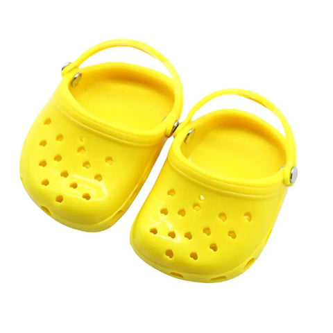 yellow slippers on a white background