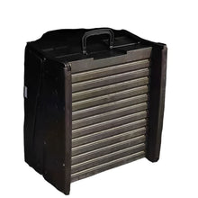 Black folding dog ramp with ridged non-slip surface and built-in carry handle for transport and storage