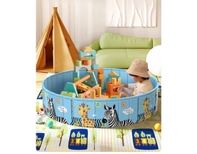 Blue foldable kids play pool with zebra and giraffe print, used indoors as a play area with colourful building blocks