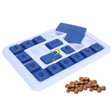 Blue interactive dog puzzle feeder with sliding treat compartments and kibble for mental enrichment