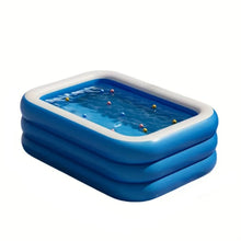 Blue rectangular inflatable dog swimming pool filled with water and colourful floating balls
