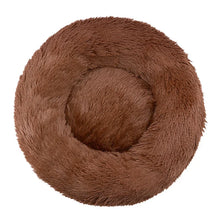 Brown fluffy donut dog bed with a soft shaggy surface, raised outer edge and cushioned centre