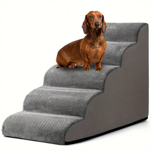 Dachshund sitting on grey foam dog stairs with textured steps for easier access to beds and sofas