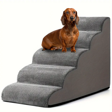 Dachshund sitting on grey foam dog stairs with textured steps for easier access to beds and sofas