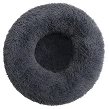 Dark grey fluffy donut dog bed with a soft shaggy surface, raised outer edge and cushioned centre