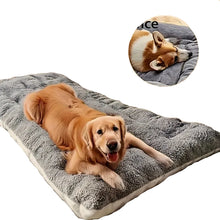 Golden retriever lying on a soft grey plush dog bed with thick cushioning, suitable for large dogs