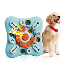 Interactive dog puzzle treat toy with sliding compartments, push button and kibble beside a golden retriever