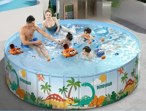 Large round foldable kids pool with colourful dinosaur print, filled with water, toys and a family swimming