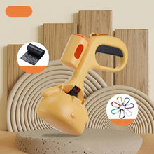 Orange portable dog poop scooper with built-in waste bag dispenser, ergonomic handle and carabiner clip