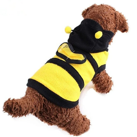Dog wearing yellow and black bee pet costume for Halloween