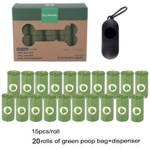 20 rolls of green dog doop bags and a box with dispenser
