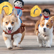 Dog wearing cowboy riding costume for Halloween