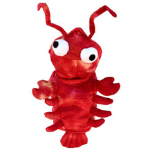 Small pet wearing red lobster Halloween costume