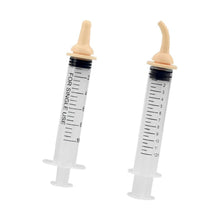 Two newborn pet feeding syringes with soft tips