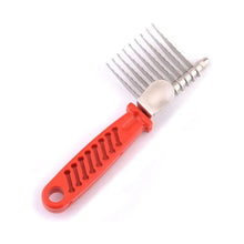 Red handled metal pet dematting comb
