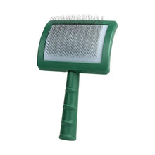Green pet grooming brush with metal bristles
