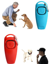2 men using dog whistle and clicker on a dog
