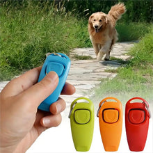 different colors of dog whistle and clicker wth dog on a background