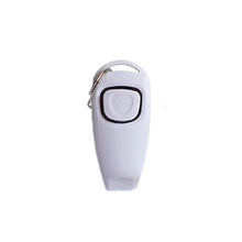 white color dog whistle and clicker