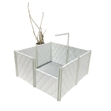 white indoor pet playpen on a white background