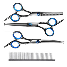 pair of scissors and combs