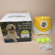 ball launcher with a box on a plain background