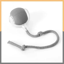 grey rolling ball toy
