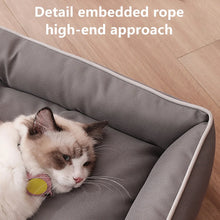 cat enjoying its bed with captions on top