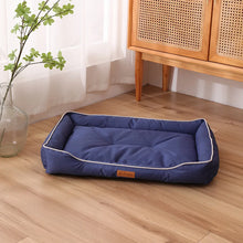 blue pet bed displayed in a cosy home background