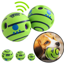 Dog biting wobble wag giggle ball 