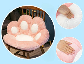 Pink plush paw-shaped chair cushion with soft padded seating and a fluffy texture
