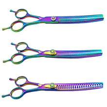 Three rainbow dog grooming thinning shears with different tooth patterns for blending, thinning and texturising pet coats