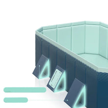 Close-up of a foldable dog swimming pool with reinforced side panels and triangular support legs for added stability