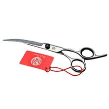 Silver curved dog grooming scissors with black finger rings and precision blades for shaping and trimming pet coats