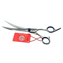 Silver curved dog grooming scissors with blue finger rings and precision blades for shaping and trimming pet coats