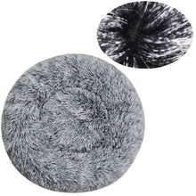 Silver grey fluffy donut dog bed with a soft faux fur surface, raised outer edge and close-up detail of the long plush fibres
