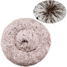 Taupe fluffy donut dog bed with a soft faux fur surface, raised outer edge and close-up detail of the long plush fibres