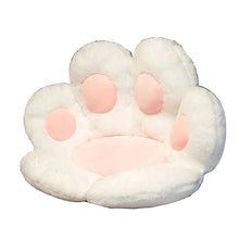 White plush paw-shaped pet bed with pink paw pads and soft cushioning for cats and small dogs