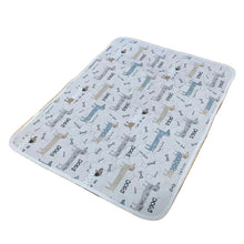 White quilted waterproof pet mat with dog and bone print, suitable for pet beds, crates and resting areas